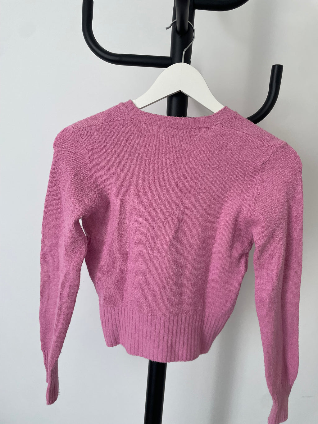 Petit pull rose enfant.