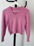 Petit pull rose enfant.