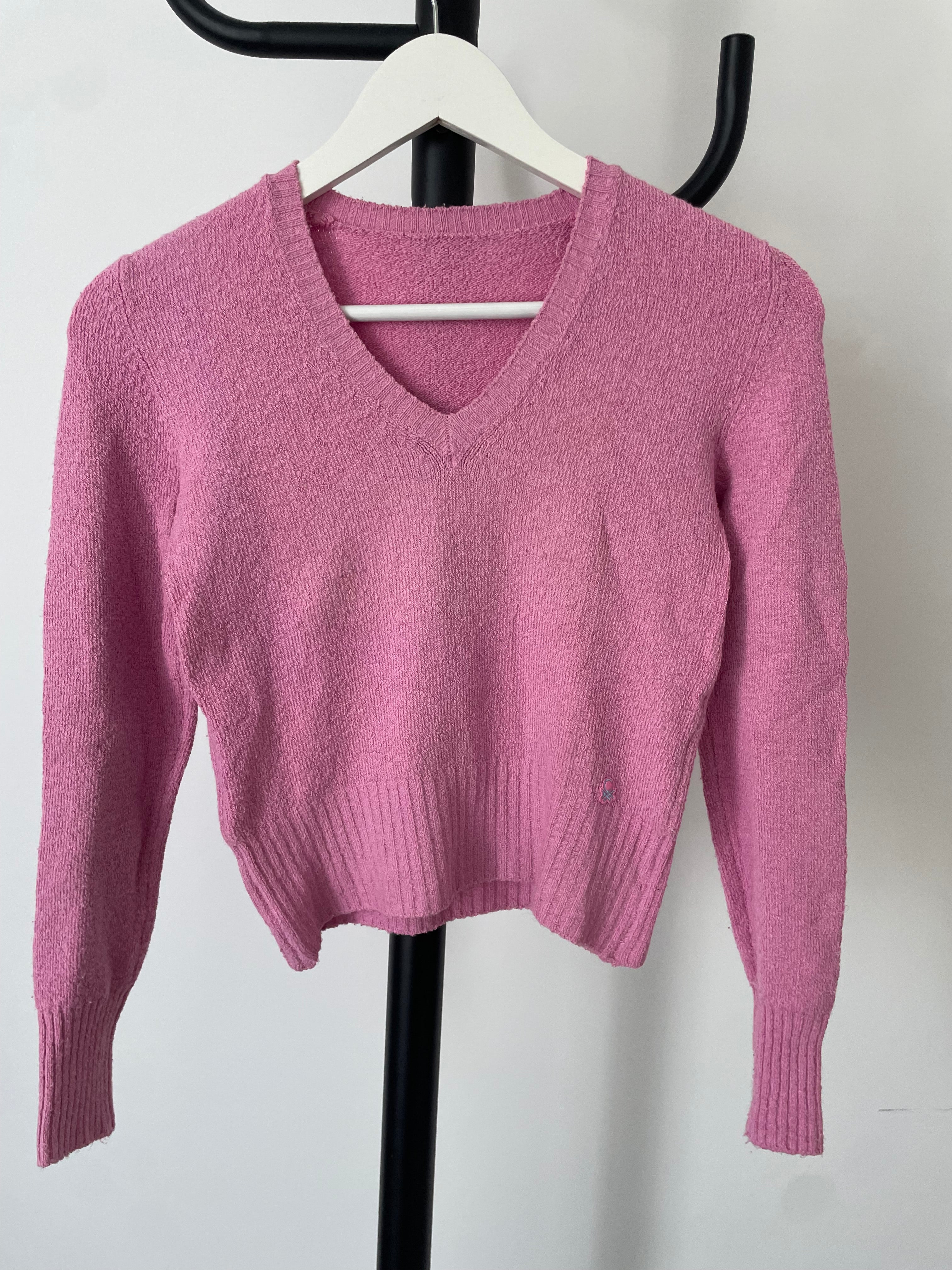 Petit pull rose enfant.